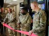 Soldiers cut ribbon and open micor market