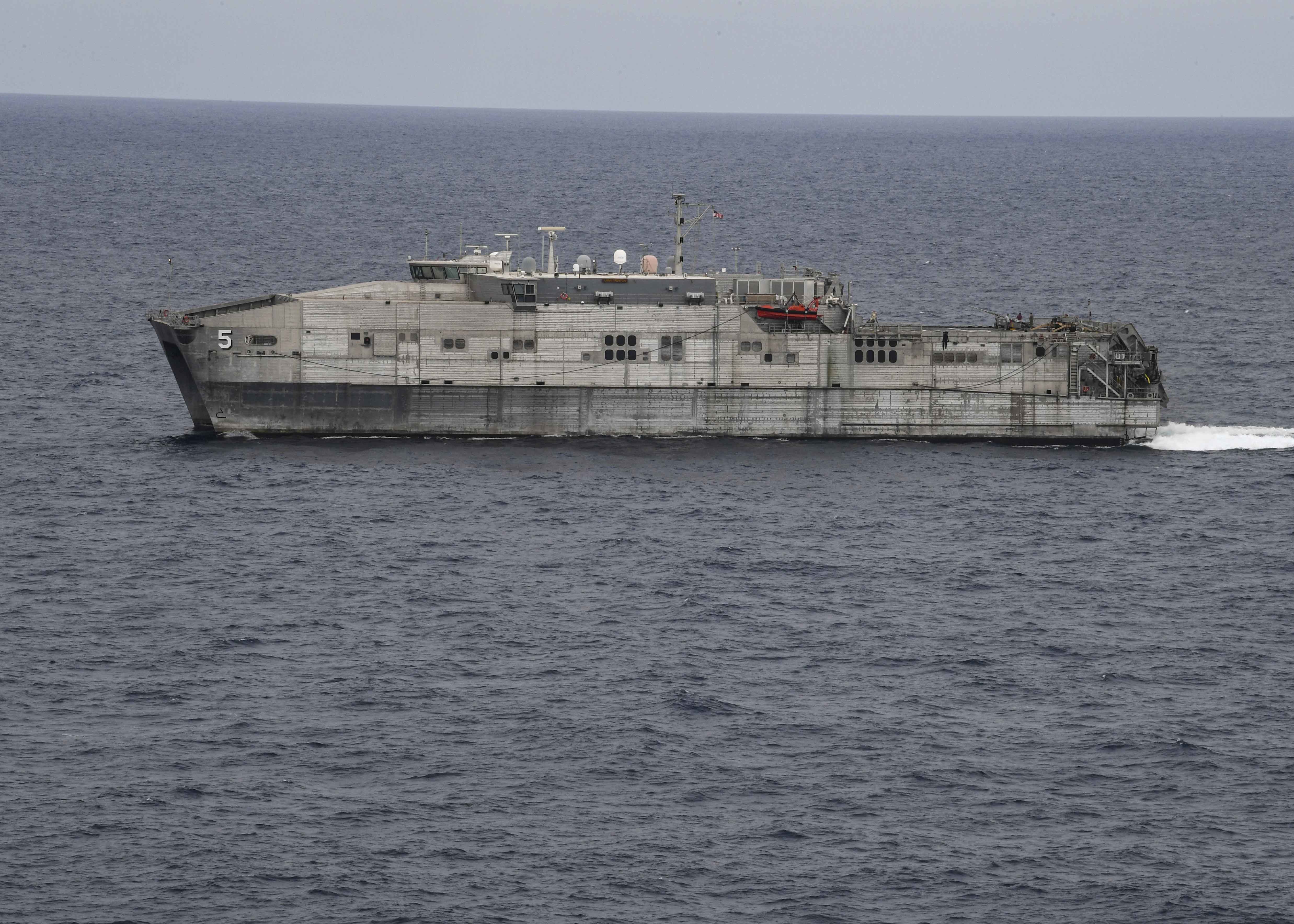 USNS Trenton (T-EPF-5) steams alongside the Expeditionary Sea Base USS Hershel “Woody” Williams (ESB 4) to kick off exercise African Lion 2021 in the Atlantic Ocean, June 13, 2021.
