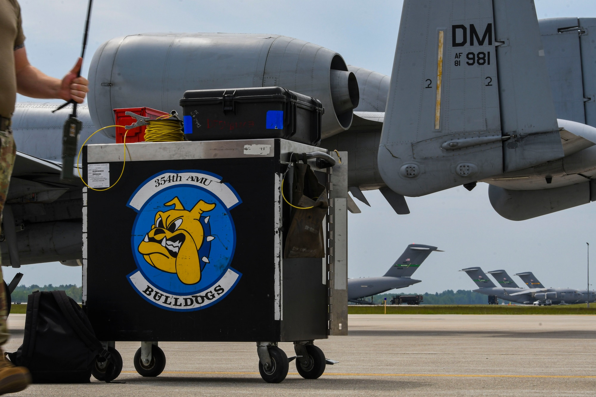 A photo of a tool box sitting on a flight line
