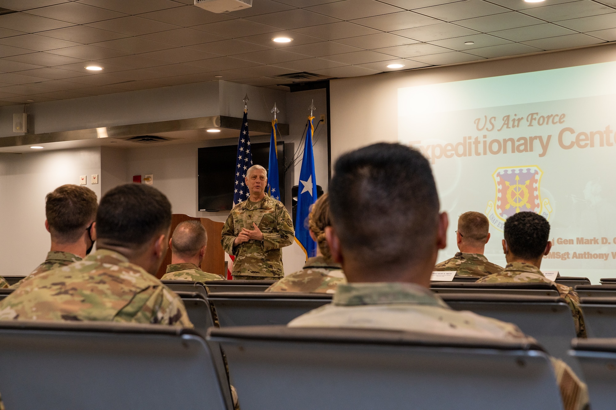 The U.S. Air Force Expeditionary Center Commander, Maj. Gen. Mark Camerer, speaks to Airman of the 731st Air Mobility Squadron during a commander's call at Osan Air Base, May 19, 2021. Camerer and USAF Expeditionary Center Command Chief, Chief Master Sgt. Anthony Green, spent time with Airmen to answer their questions. (U.S. Air Force photo by Senior Airman Branden Rae)
