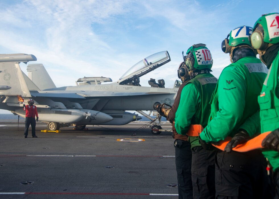 Sailors fight a simulated fire on the flight deck of the Nimitz-class aircraft carrier USS Harry S. Truman (CVN 75) during Tailored Ship's Training Availability (TSTA) and Final Evaluation Problem (FEP).