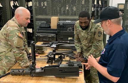 James Wood, a U.S. Army Tank-automotive and Armaments Command Soldier Chemical-Biological Logistics Assistance Representative assigned to Army Field Support Battalion-Germany, 405th Army Field Support Brigade, provides training to 18th Military Police Brigade Soldiers on the M2A1 .50 caliber machine gun. LARs are Army civilians serving in motor pools, hangars, maintenance shops, and offices around the world. Highly trained, they bring more than two dozen specialty skills to Army equipment readiness requirements.