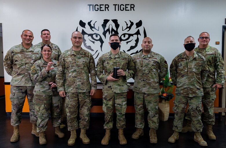 A group photo inside the 79th Fighter Generation Squadron.