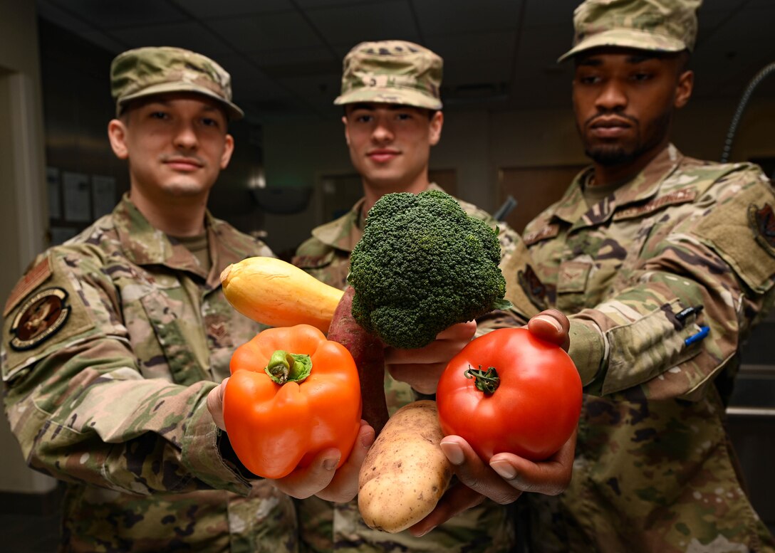 Three Airmen posing for a photo