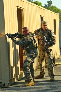 Tech. Sgt. Peter Cummings engages the enemy during a support-by-fire training exercise on Joint Base Cape Cod, Mass., June 5, 2021. Cummings is an assistant flight sergeant with the 102nd Security Forces Squadron.