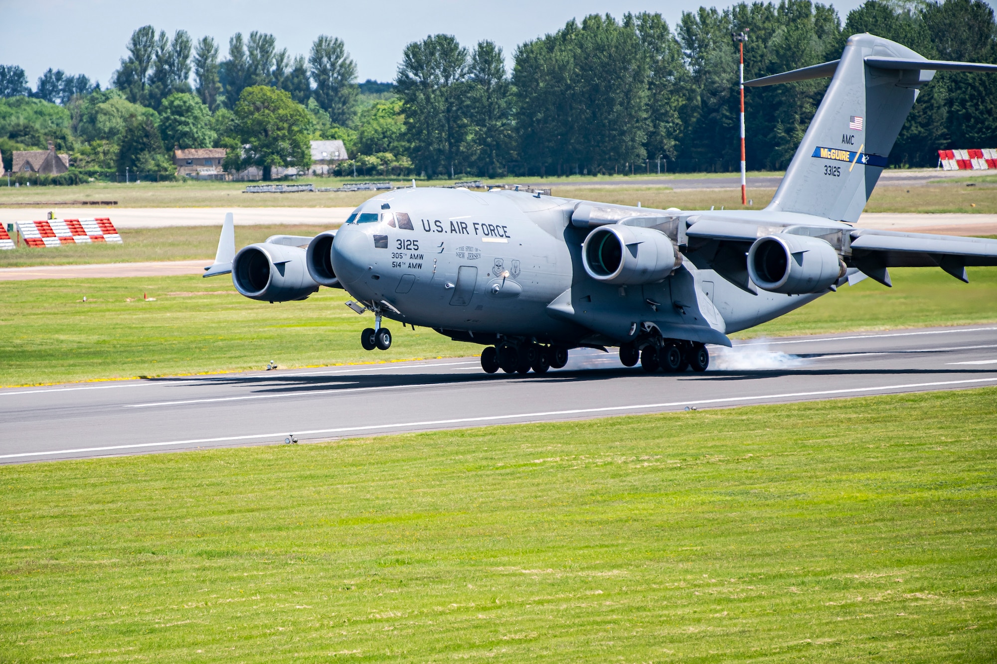 A C-17 Globemaster III lands on the runway at RAF Fairford, England, June 14, 2021. Multiple C-17s arrived at Fairford in support of President Joe Biden’s visit to England for the G7 summit. (U.S. Air Force photo by Senior Airman Eugene Oliver)