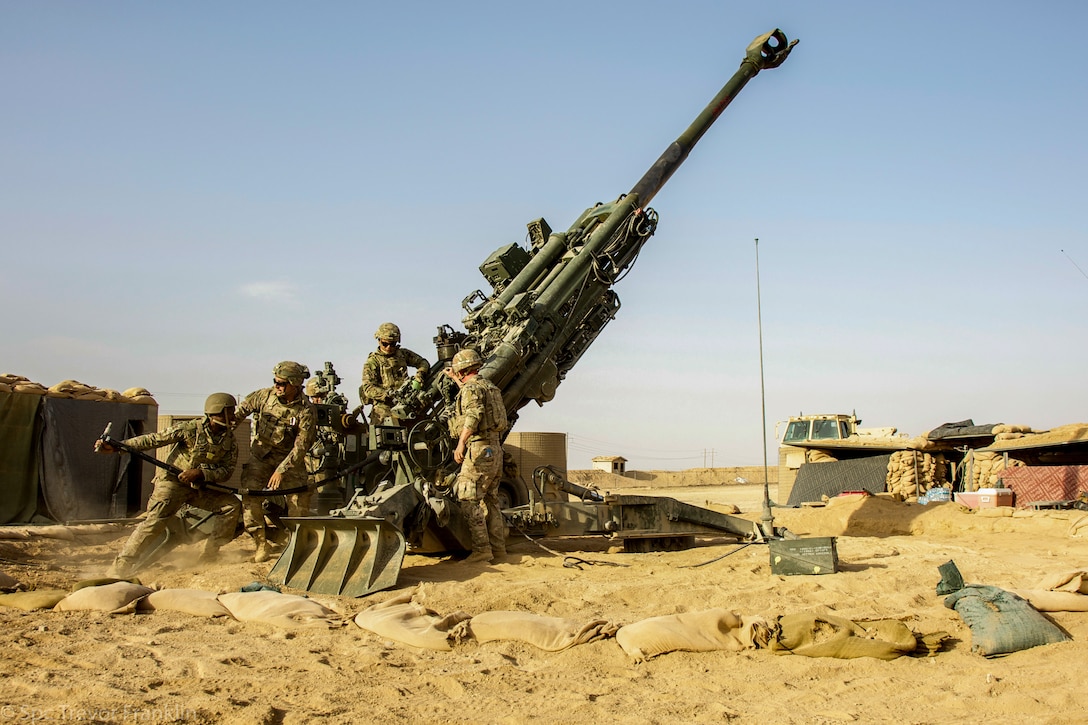 U.S. Army soldiers assigned to the C/2-156th Infantry, 2nd Plt Charlie Battery/ 1-141 FA conduct crew training on a M777 Howitzer at MSS Conoco, Syria., June 14, 2021. The purpose of crew training is to validate the expertise of area security operations. (U.S. Army photo by Spc. Trevor Franklin)
