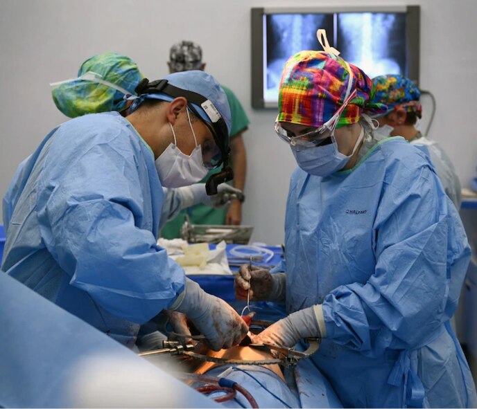 U.S. Army Lt. Col. Andrew Mendedorp, left, the chief of urology at Tripler Army Medical Center, Honolulu, Hawaii, and U.S. Air Force Lt. Col. Necia Pope, a urologist with the 59th Medical Wing, Joint Base San Antonio-Lackland, operate on a patient at Hospital del Sur in Choluteca, Honduras, May 21, 2021. U.S. military doctors arrived in Choluteca for a urologic surgical readiness training exercise to provide essential surgeries to pre-selected Honduran patients. (Courtesy photo)