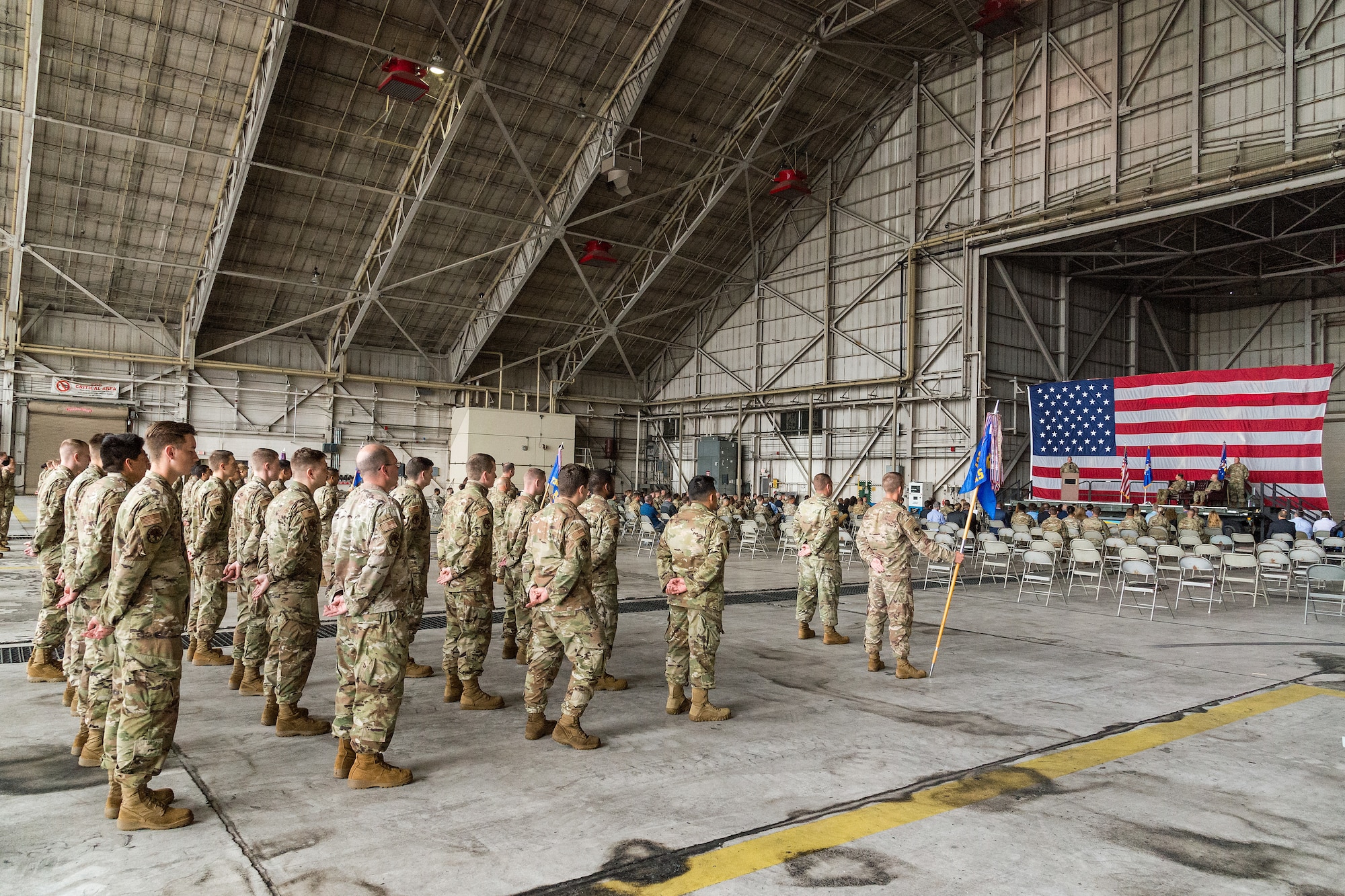 Personnel from the 436th Maintenance Group stand in formation during the 436th MXG Change of Command ceremony on Dover Air Force Base, Delaware, June 11, 2021. Col. Christopher May relinquished command to Col. Bary Flack in a ceremony officiated by Col. Matt Husemann, 436th Airlift Wing commander. (U.S. Air Force photo by Roland Balik)