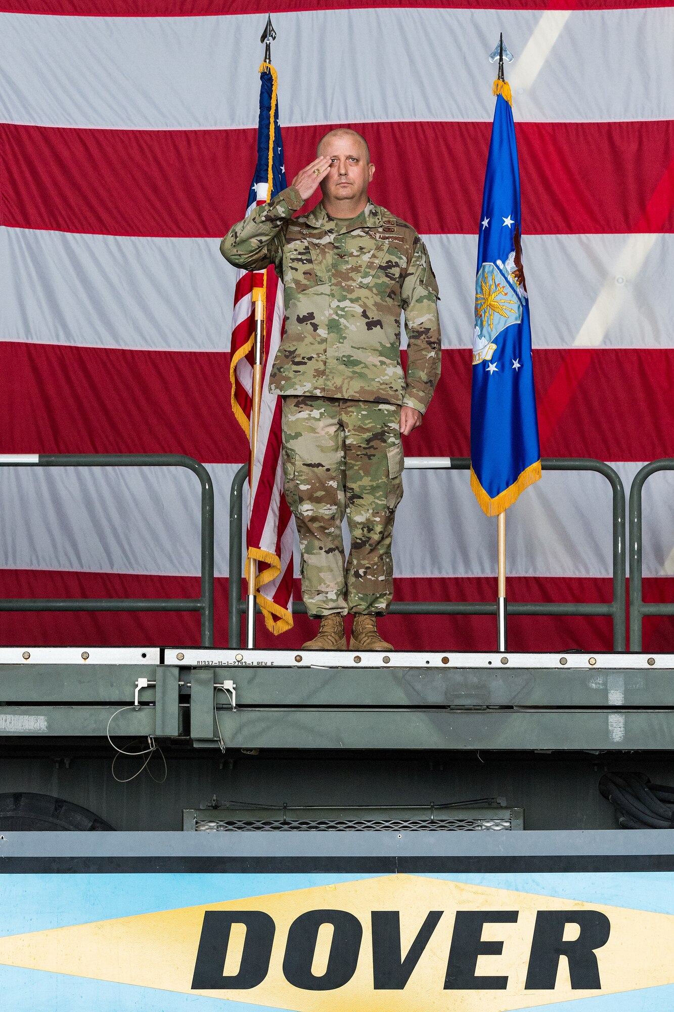 Col. Bary Flack, 436th Maintenance Group commander, receives his first salute from a formation of Airmen during the 436th MXG Change of Command ceremony on Dover Air Force Base, Delaware, June 11, 2021. Col. Christopher May relinquished command to Flack in a ceremony officiated by Col. Matt Husemann, 436th Airlift Wing commander. The 436th MXG supports the worldwide global mobility mission by providing trained maintenance specialists for two of the Air Force's cargo transport aircraft, the C-5M Super Galaxy and the C-17A Globemaster III. (U.S. Air Force photo by Roland Balik)
