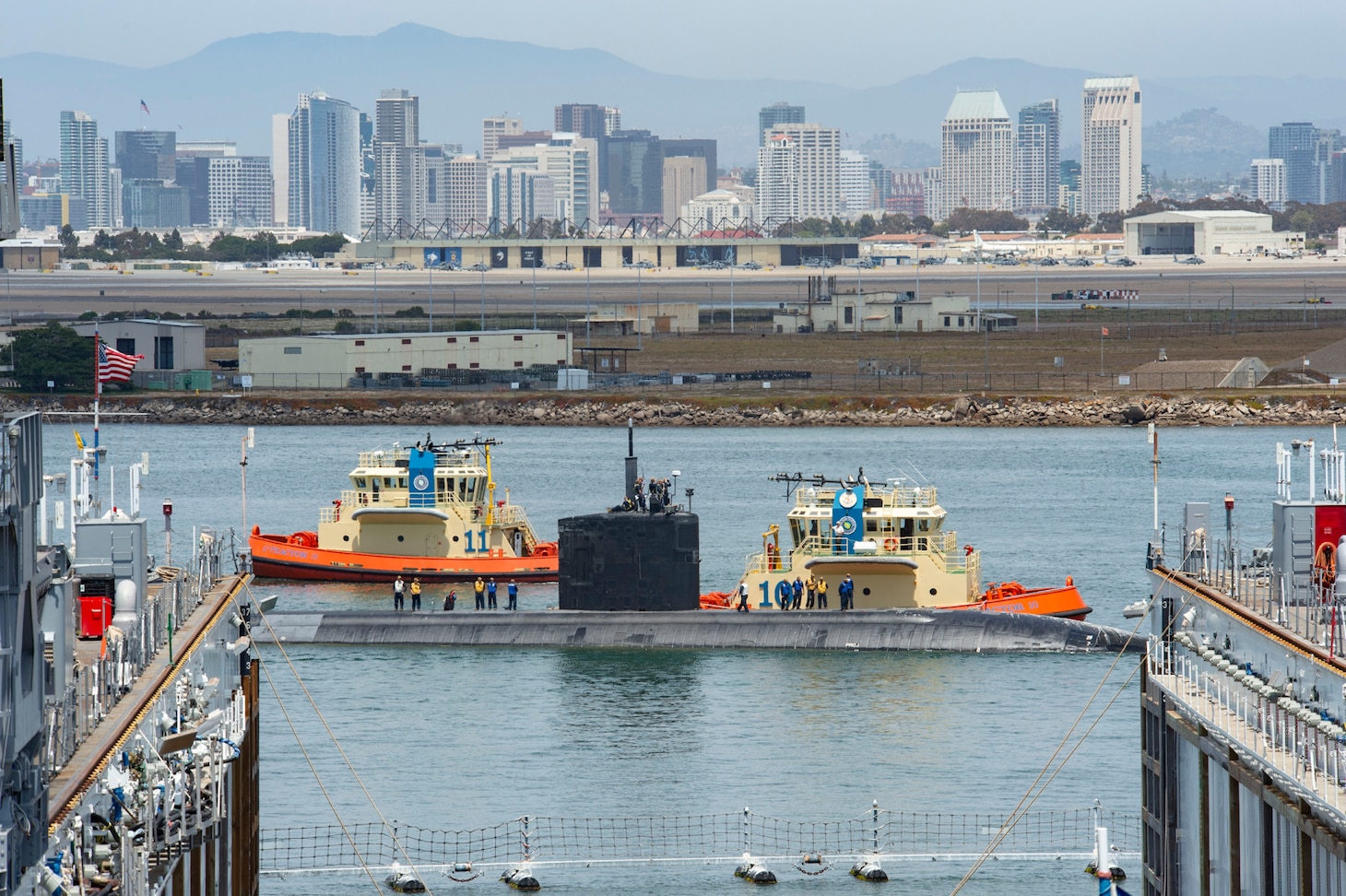 SAN DIEGO (June 15, 2021)- Sailors assigned to the Los Angeles-class fast-attack submarine USS Hampton (SSN 767) depart Naval Base Point Loma for a Western Pacific deployment, June 15. Hampton will deploy to the U.S. 7th Fleet area of responsibility, where the crew will support national security interests and conduct maritime security operations. (U.S. Navy photo by Mass Communication Specialist 2nd Class Thomas Gooley/Released)