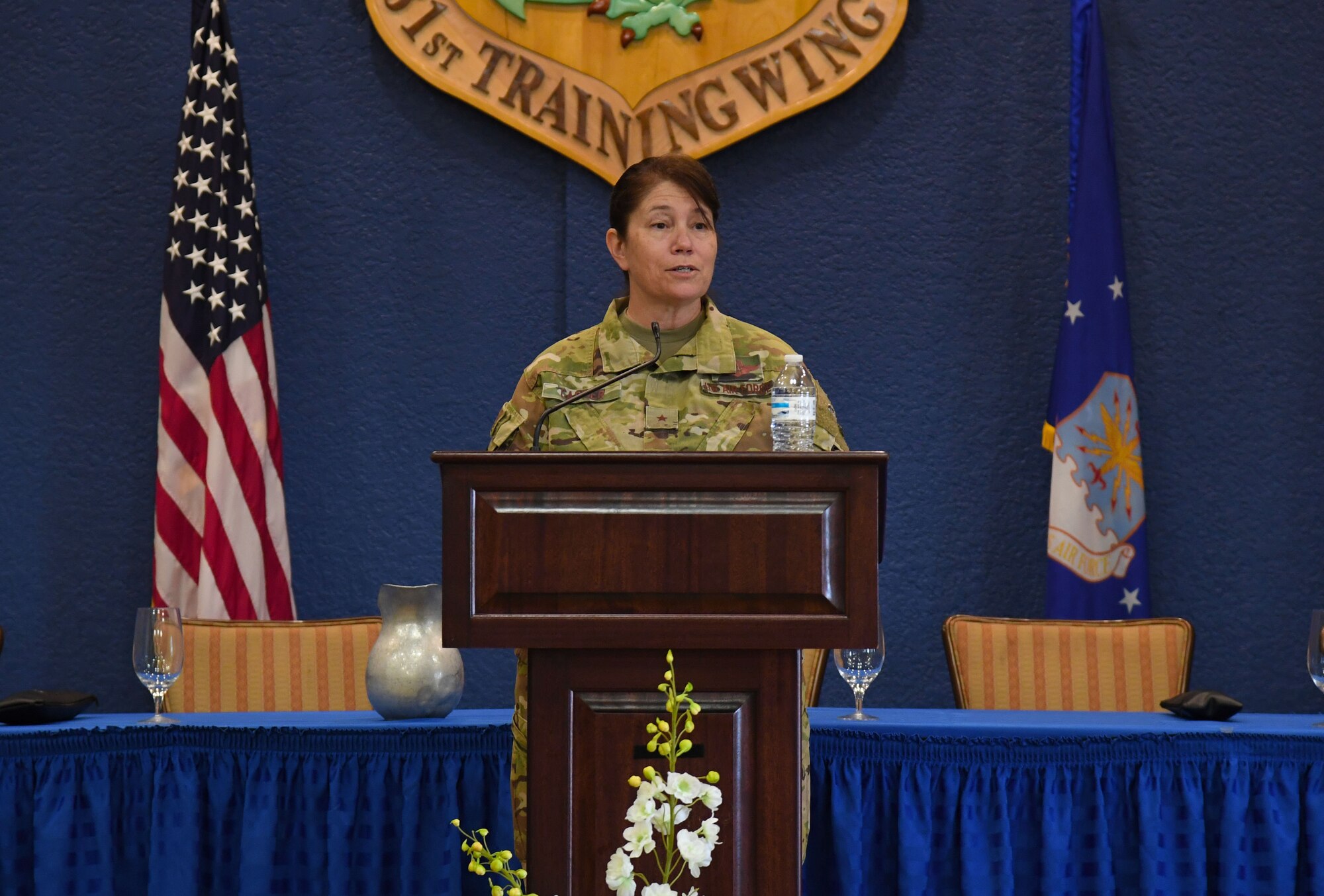 U.S. Air Force Brig. Gen. Brenda Cartier, 19th Air Force vice commander, delivers remarks for Pride Month inside the Bay Breeze Event Center at Keesler Air Force Base, Mississippi, June 15, 2021. Keesler celebrates Pride Month throughout June, with events such as a scavenger hunt, discussion panel and an LGBTQ+ informational expo. (U.S. Air Force photo by Kemberly Groue)
