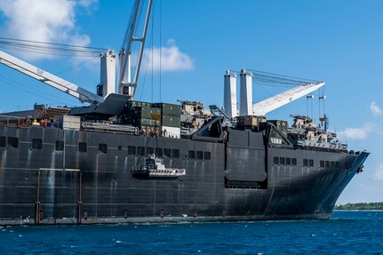 DIEGO GARCIA, British Indian Ocean Territory (November 11, 2019) Sailors lower a maritime prepositioning force utility boat from Military Sealift Command Bob Hope-class roll-on roll-off vehicle cargo ship USNS Seay (T-AKR 302) using a crane during an Improved Navy Lighterage System (INLS) training mission. Navy Cargo Handling Battalion (NCHB) 1, NCHB 8, NCHB 11, NCHB 13, Assault Craft Unit (ACU) 1 and Amphibious Construction Battalion (ACB) 1 are participating in the INLS training mission under the direction of Commander, Task Force (CTF) 75 in preparation for upcoming joint cargo handling exercise Native Fury 2020. (U.S. Navy photo by Mass Communication Specialist 1st Class Nathan Carpenter)