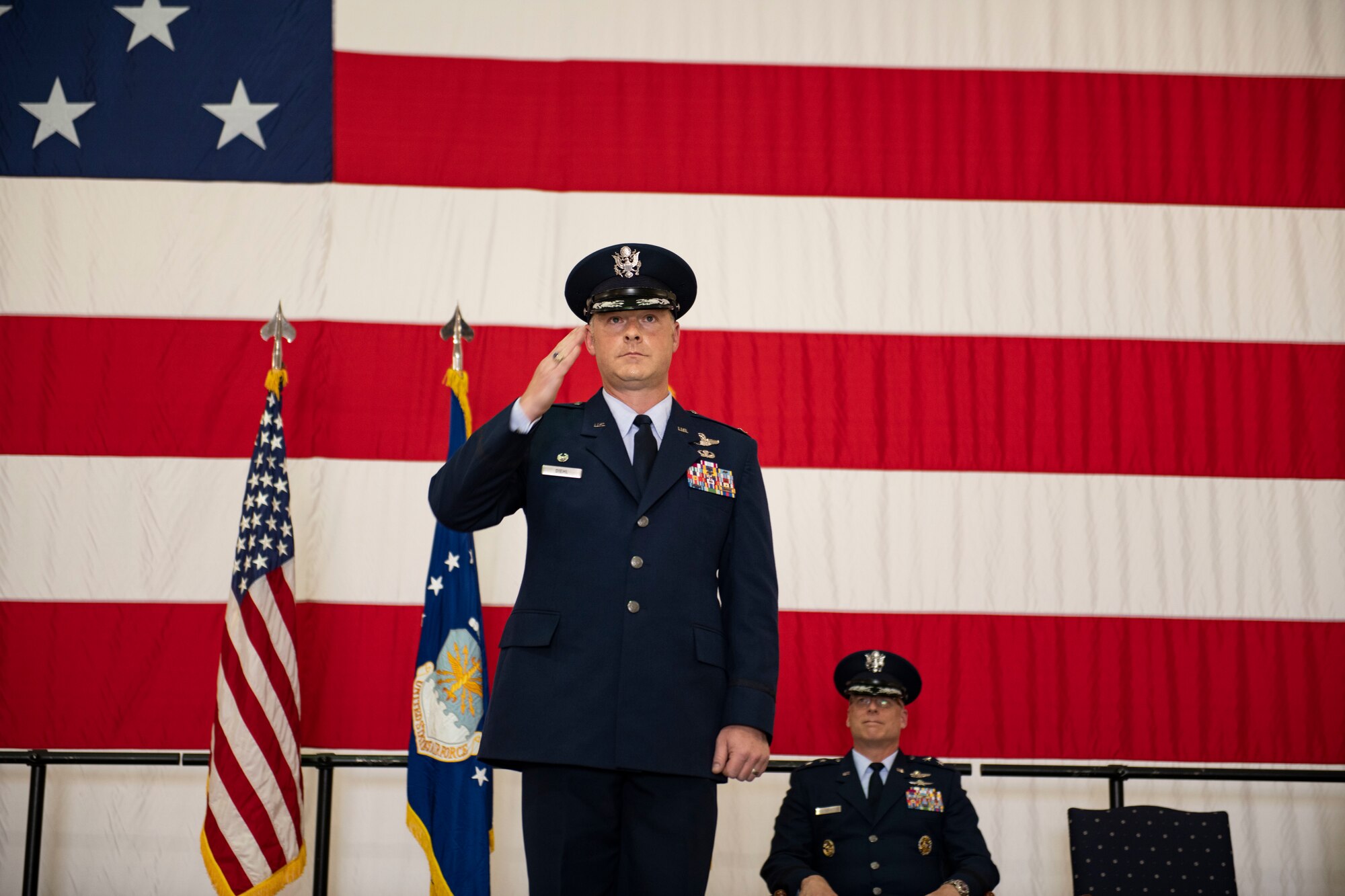 U.S. Air Force Col. Daniel Diehl, 509th Bomb Wing commander, renders his first salute to the unit during the 509th BW change of command ceremony, Whiteman Air Force Base, Missouri, June 16, 2021. Over the past months, Diehl has trained and qualified in the stealth bomber and over the next couple of weeks will meet with representatives of each group on base to immerse himself in Team Whiteman’s wide-ranging missions and community. (U.S. Air Force photo by Airman First Class Victoria Hommel)