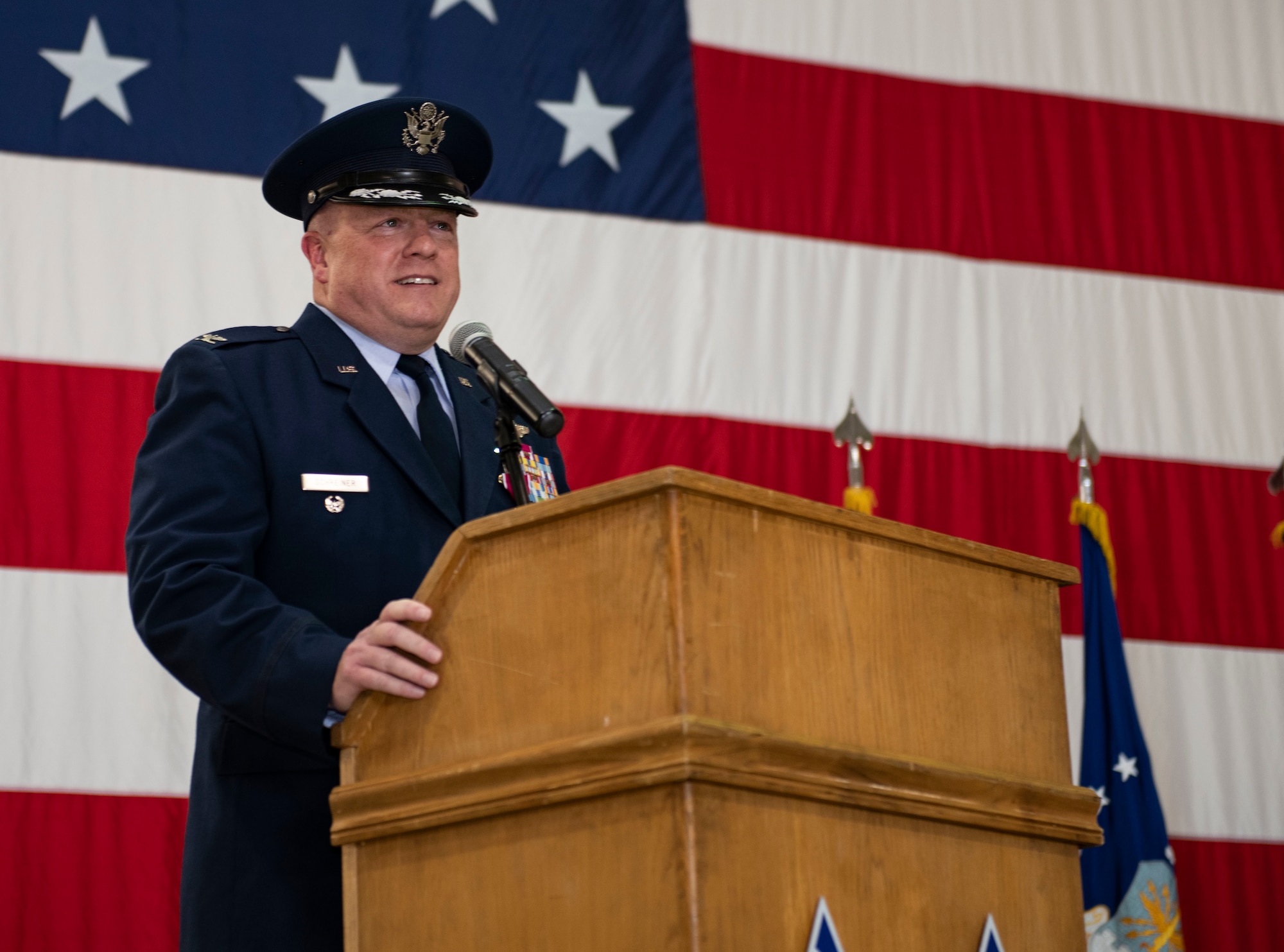 U.S. Air Force Col. Jeffrey Schreiner, former 509th Bomb Wing commander, thanks his family and members of the 509th BW for their support and service during the 509th BW change of command ceremony, Whiteman Air Force Base, Missouri, June 16, 2021. After two years in command and leading Team Whiteman through the global COVID-19 pandemic, Schreiner is headed for a new leadership position with the United States Strategic Command at Offutt Air Force Base, Nebraska. (U.S. Air Force photo by Airman First Class Victoria Hommel)