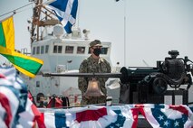 210615-N-KZ419-1044 NAVAL SUPPORT ACTIVITY BAHRAIN (June 15, 2021) Boatswain’s Mate 2nd Class Christopher Vita, assigned to USCGC Adak (WPB 1333), rings the ship’s bell during the decommissioning ceremony for Adak and USCGC Aquidneck (WPB 1309) onboard Naval Support Activity Bahrain, June 15. Adak and Aquidneck operated in the U.S. 5th Fleet area of operations since 2003 in support of Operation Iraqi Freedom, Enduring Freedom, Inherent Resolve and Spartan Shield. (U.S. Navy photo by Mass Communication Specialist 3rd Class Dawson Roth)