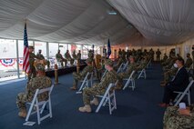 210615-N-KZ419-1243 NAVAL SUPPORT ACTIVITY BAHRAIN (June 15, 2021) Lt. Nathan Zinn, commanding officer of USCGC Aquidneck (WPB 1309), delivers remarks during the decommissioning ceremony for Aquidneck and USCGC Adak (WPB 1333) onboard Naval Support Activity Bahrain, June 15. Adak and Aquidneck operated in the U.S. 5th Fleet area of operations since 2003 in support of Operation Iraqi Freedom, Enduring Freedom, Inherent Resolve and Spartan Shield. (U.S. Navy photo by Mass Communication Specialist 3rd Class Dawson Roth)