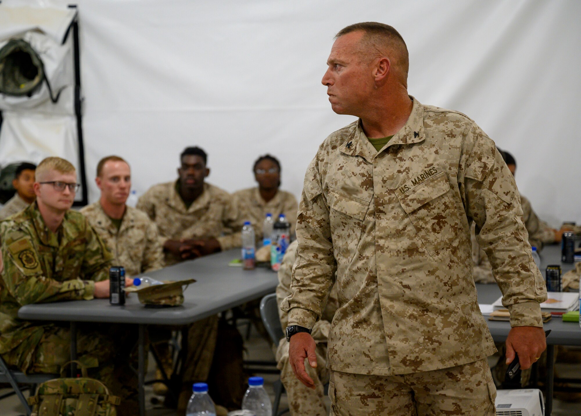 Marine Corps unit commander briefs class.