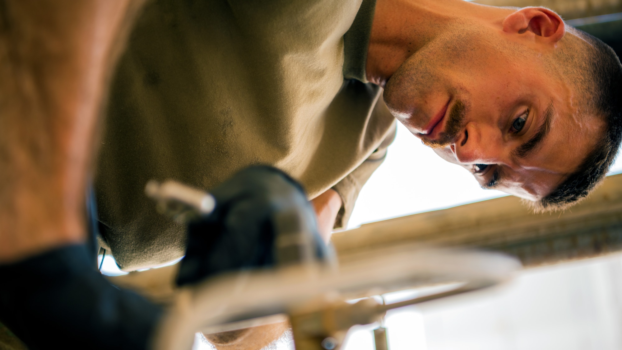 U.S. Air Force Airmen from the 380th Expeditionary Civil Engineer Squadron water & fuel systems maintenance and the 380th Expeditionary Logistic Readiness Squadron fuels flight perform maintenance on a fuels system at Al Dhafra Air Base, United Arab Emirates, June 14, 2021.