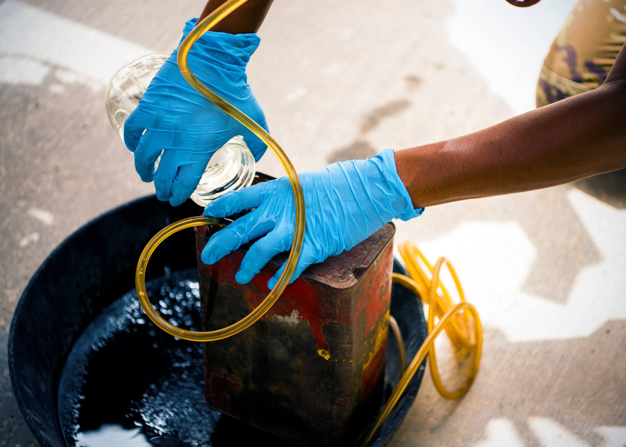 U.S. Air Force Airmen from the 380th Expeditionary Civil Engineer Squadron water & fuel systems maintenance and the 380th Expeditionary Logistic Readiness Squadron fuels flight perform maintenance on a fuels system at Al Dhafra Air Base, United Arab Emirates, June 14, 2021.