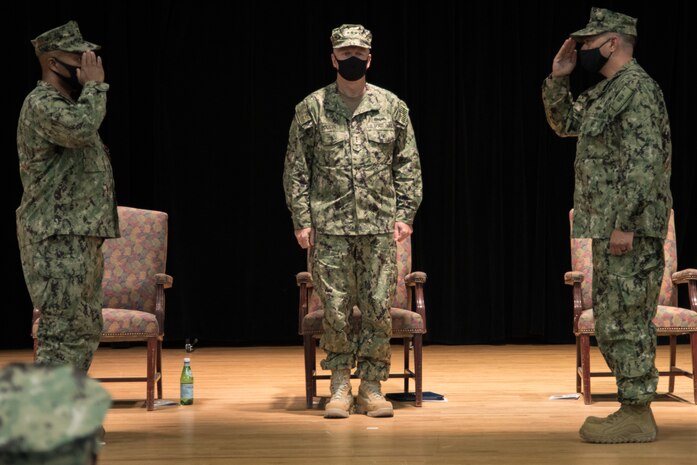 210616-N-YD641-1048 NAVAL SUPPORT ACTIVITY BAHRAIN (June 16, 2021) Capt. Willie Carmichael, left, outgoing Patrol Forces Southwest Asia Commander (PATFORSWA), salutes Capt. Benjamin Burg, incoming PATFORSWA Commander, during a change of command ceremony onboard Naval Support Activity Bahrain, June 16. PATFORSWA is the Coast Guard's largest unit outside of the U.S. playing a key role in supporting Navy security cooperation, maritime security, and maritime infrastructure protection operations in the U.S. 5th Fleet area of operations. (U.S. Navy photo by Mass Communication Specialist 2nd Class Matthew Riggs)