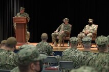 210616-N-YD641-1062 NAVAL SUPPORT ACTIVITY BAHRAIN (June 16, 2021) Capt. Benjamin Berg, incoming commander of Patrol Forces Southwest Asia (PATFORSWA) gives remarks during a change of command ceremony onboard Naval Support Activity Bahrain, June 16. PATFORSWA is the Coast Guard's largest unit outside of the U.S. playing a key role in supporting Navy security cooperation, maritime security, and maritime infrastructure protection operations in the U.S. 5th Fleet area of operations. (U.S. Navy photo by Mass Communication Specialist 2nd Class Matthew Riggs)