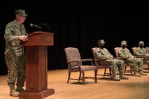 210616-N-YD641-1026 NAVAL SUPPORT ACTIVITY BAHRAIN (June 16, 2021) Vice Adm. Steven Poulin, commander, U.S. Coast Guard Atlantic, gives remarks during a change of command ceremony for Patrol Forces Southwest Asia (PATFORSWA) onboard Naval Support Activity Bahrain, June 16. PATFORSWA is the Coast Guard's largest unit outside of the U.S. playing a key role in supporting Navy security cooperation, maritime security, and maritime infrastructure protection operations in the U.S. 5th Fleet area of operations. (U.S. Navy photo by Mass Communication Specialist 2nd Class Matthew Riggs)