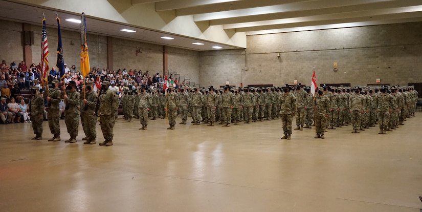 Soldiers from 1st Squadron, 104th Cavalry Regiment, 2nd Infantry Brigade Combat Team, 28th Infantry Division, stand at attention during a deployment ceremony on June 14, 2021, at Southampton Armory, Philadelphia. More than 200 Soldiers are set to deploy to the middle east to support U.S. Central Command. (U.S. Army photo by Sgt. 1st Class Matthew Keeler)