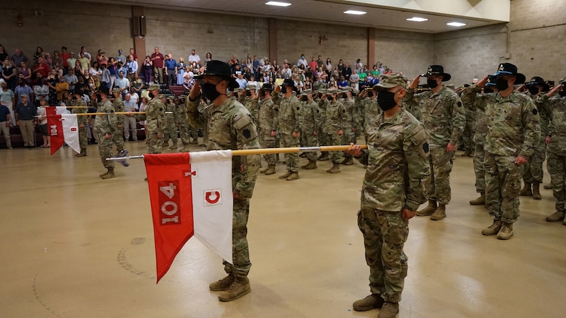Soldiers from 1st Squadron, 104th Cavalry Regiment, 2nd Infantry Brigade Combat Team, 28th Infantry Division, salute the United States Flag during the national anthem during a deployment ceremony on June 14, 2021, at Southampton Armory, Philadelphia. More than 200 Soldiers are set to deploy to the Middle East to support U.S. Central Command. (U.S. Army photo by Sgt. 1st Class Matthew Keeler)