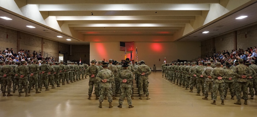 Soldiers from 1st Squadron, 104th Cavalry Regiment, 2nd Infantry Brigade Combat Team, 28th Infantry Division, stand in formation before the gathered friends and family during a deployment ceremony on June 14, 2021, at Southampton Armory, Philadelphia. More than 200 Soldiers are set to deploy to the middle east to support U.S. Central Command. (U.S. Army photo by Sgt. 1st Class Matthew Keeler)