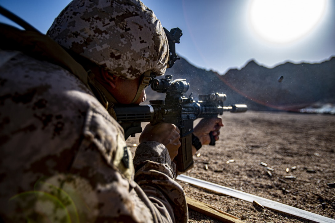 1st Sgt. Valentin Monroy, a company first sergeant assigned to the 24th Marine Expeditionary Unit, fires a M4 carbine while participating in live-fire training during a Theater Amphibious Combat Rehearsal in Camp Titin, Jordan, June 9,2021. TACR integrates U.S. Navy and Marine Corps assets to exercise a range of critical combat-related capabilities, both afloat and ashore. 24th MEU is deployed to the U.S. 5th Fleet area of operations in support of naval operations to ensure maritime stability and security in the central region, connecting the Mediterranean and Pacific through the western Indian Ocean and three strategic choke points.