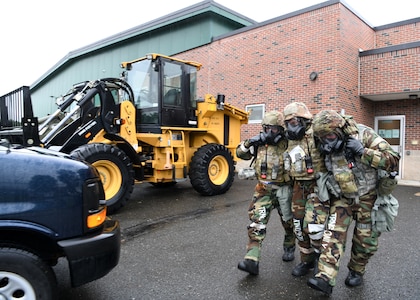 Airmen from the 104th Medical Group assess, treat and transport Airmen after a simulated attack during a readiness exercise at Barnes Air National Guard Base, Massachusetts, June 10-13. The exercise enabled all elements of the 104th Fighter Wing to hone their skills in support of both state and federal missions.