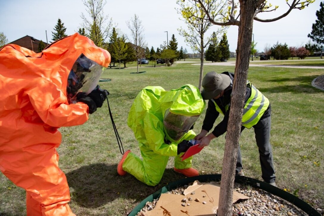 A chemical, biological, radiological and nuclear team, assigned to the 28th Civil Engineer Squadron, and the bioenvironmental engineering flight, assigned to the 28th Medical Group, conduct chemical agent tests during a training scenario for exercise Ready Eagle on Ellsworth Air Force Base, S.D., May 14, 2021.