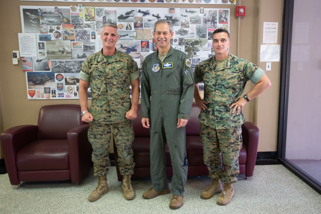 U.S. Air Force Gen. Kenneth S. Wilsbach, commander of Unites States Pacific Air Forces and Air Component Command within the U.S. Indo-Pacific Command, and Executive Director Pacific Air Combat Operations Staff, Joint Base Pearl Harbor, Hawaii, Maj. Gen. Christopher J. Mahoney, commanding general of 3rd Marine Aircraft Wing, and Col. Charles B. Dockery, commanding officer of Marine Corps Air Station Miramar, pose for a photo at Marine Corps Air Station Miramar, California, June 15, 2021. The exchange of tactics, techniques and procedures allows joint services to maintain rigorous standards to not only survive on the modern battlefield but to fly, fight and win.