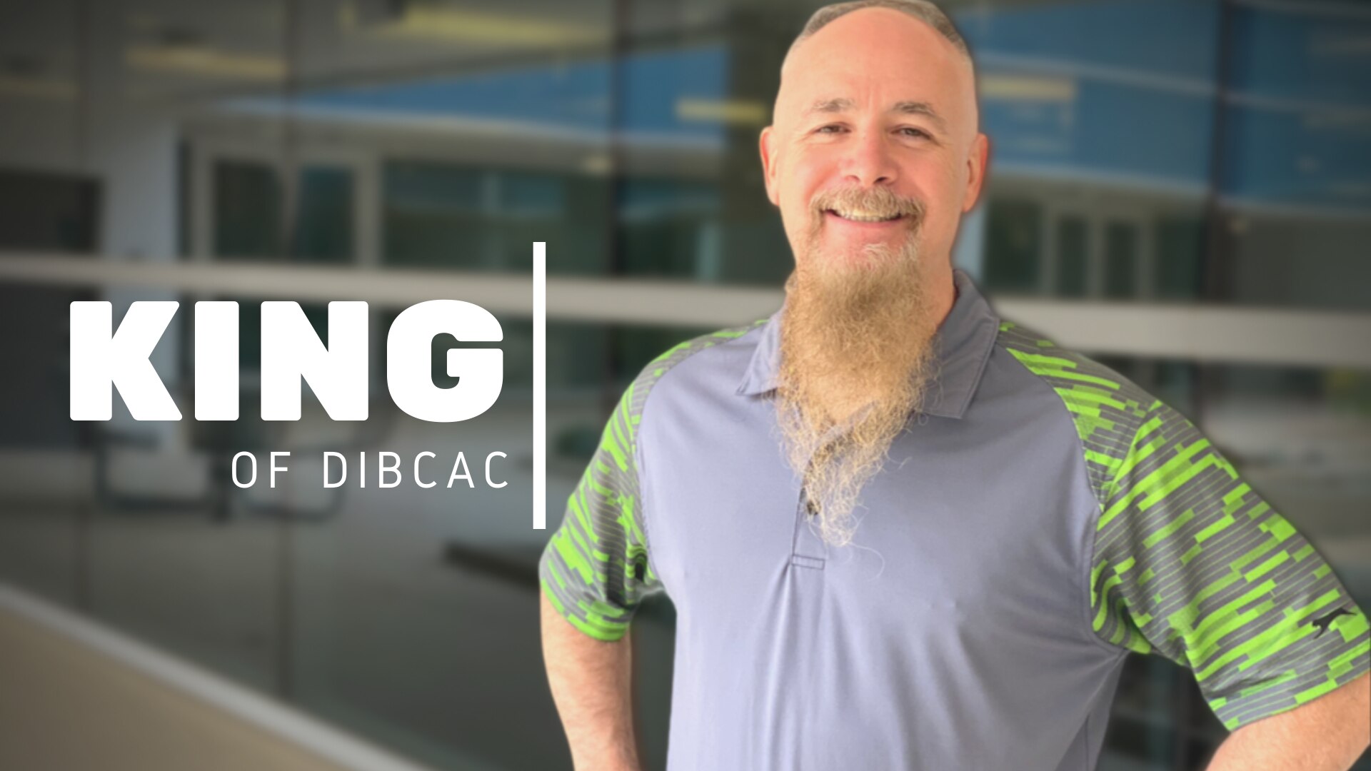 Man poses for photo with text reading "King of DIBCAC"