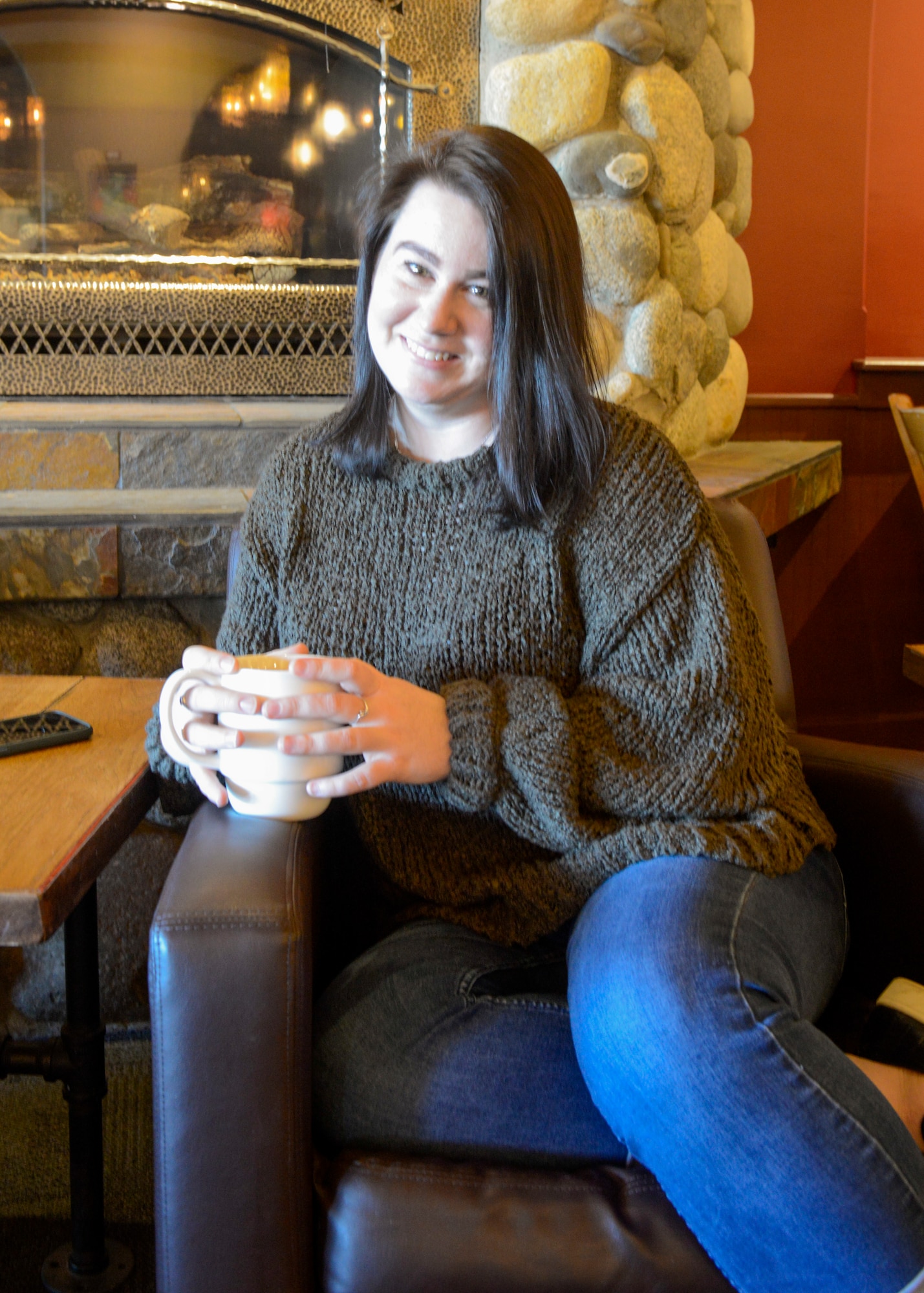 U.S. Air Force Staff Sgt. Mikhaila Brown, national tactical integration analyst with the 381st Intelligence Squadron, enjoys a cup of coffee April 25, 2021, in Anchorage, Alaska.