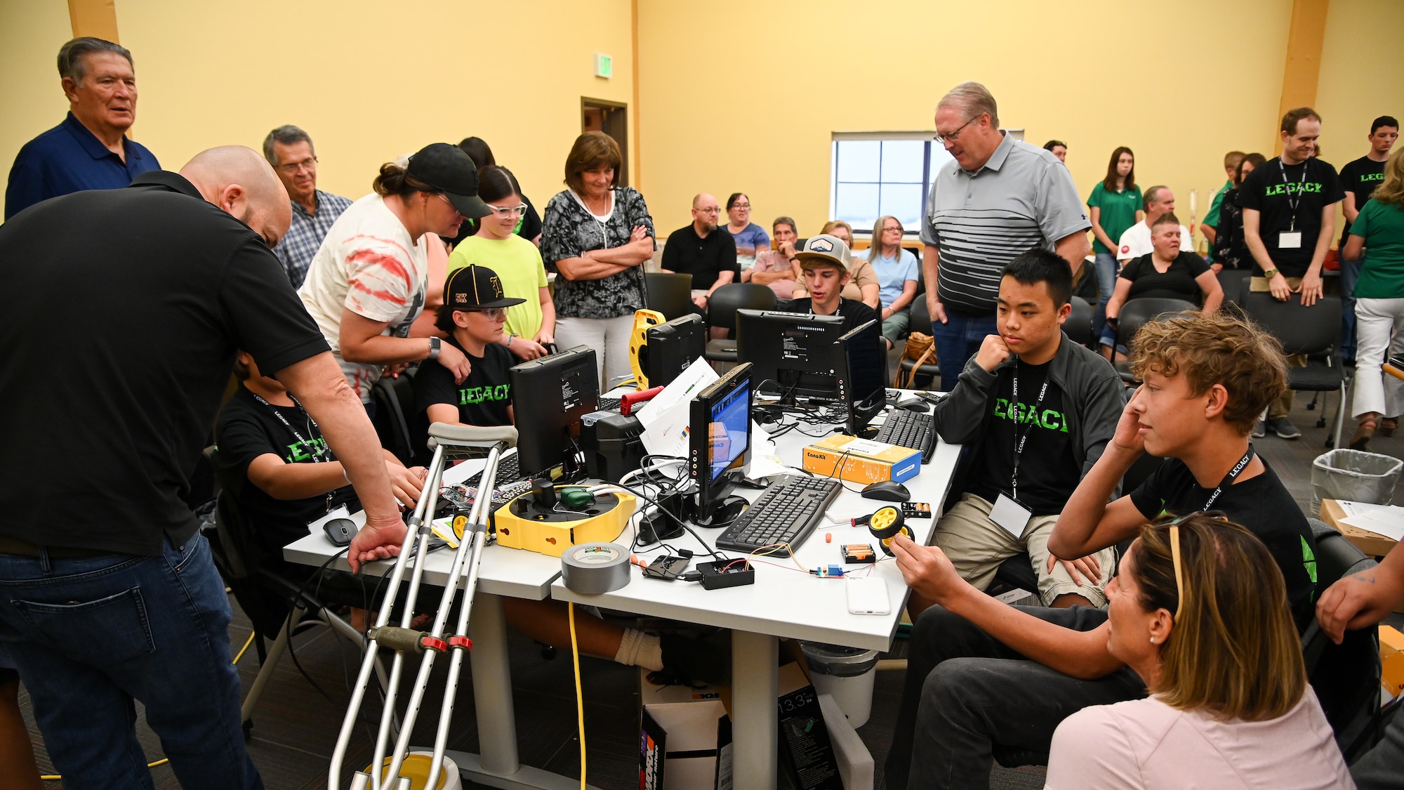 LEGACY program students present projects completed during a summer camp to their families at an open house event in Clearfield, Utah, June 11, 2021. The Leadership Experience Growing Apprenticeships Commited to Youth, or LECAGY program, provides a STEM pipeline that starts with students at age 11 and keeps them in the program until college graduation. (U.S. Air Force photo by R. Nial Bradshaw)