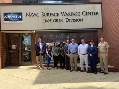 IMAGE: From left to right, Claude Berube, legislative director for U.S. Rep. Elaine Luria; Kristi Black and Mackenzie Heidelmark, district coordinators for U.S. Rep. Abigail Spanberger; Charlotte Hurd, military liaison for U.S. Sen. Mark Warner; Darren Barnes, Naval Surface Warfare Center Dahlgren Division Deputy Technical Director; A.J. Gunther, staff member for U.S. Rep. Rob Wittman; Chris Jones, deputy district director for Wittman; Timothy Minor, legislative aide for Virginia Del. Margaret B. Ransone; and NSWCDD Commanding Officer Capt. Stephen “Casey” Plew are pictured outside of the command’s headquarters.