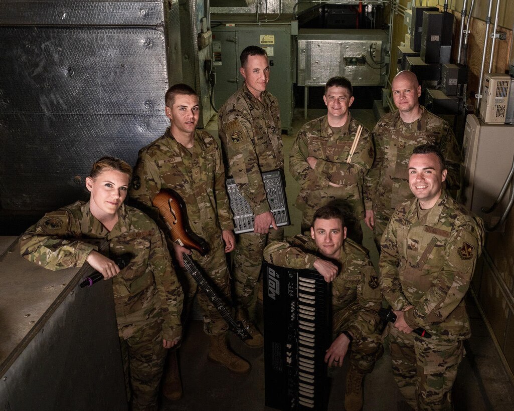 Members of the U.S. Air Forces Central Command Band who will deploy this summer, back row, pictured left to right: Technical Sgt. Nadia Sosnoski, Technical Sgt. Andy Mowatt, Technical Sgt. Nathan Martin, Technical Sgt. Daniel Dowling, Master Sgt. (sel) Mike Wittrien. Front row, left to right is Technical Sgt. Aaron Trasatt and Technical Sgt. Sam Allen. (U.S. Air Force photo by Senior Master Sgt. Josh Kowalsky)