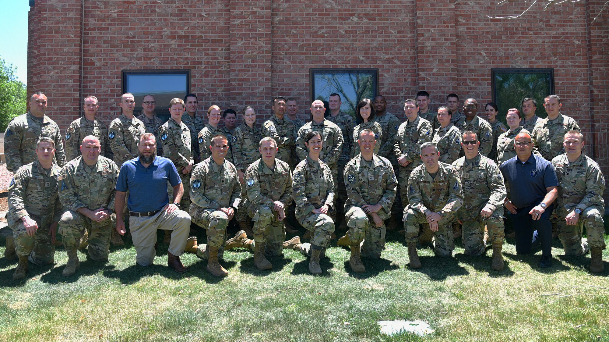 Peterson-Schriever Garrison leadership poses for a photo