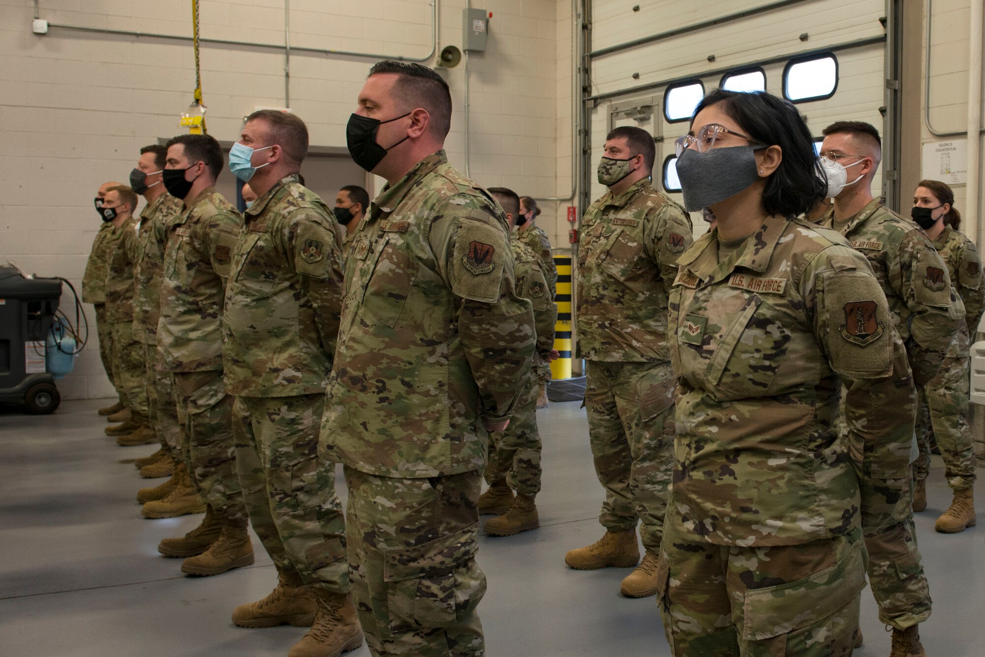 Members of the Connecticut Air National Guard, 103rd Air Control Squadron stand in formation during a briefing by Maj. Gen. Fran Evon, The Adjutant General of the Connecticut National Guard, April 15, 2021 in Orange, Connecticut. Members of 103rd ACS deployed to multiple locations in Southwest Asia and the United States in support of Operation Inherent Resolve and Mission Resolute Support. (U.S. Air National Guard photo by Master Sgt. Tamara R. Dabney)