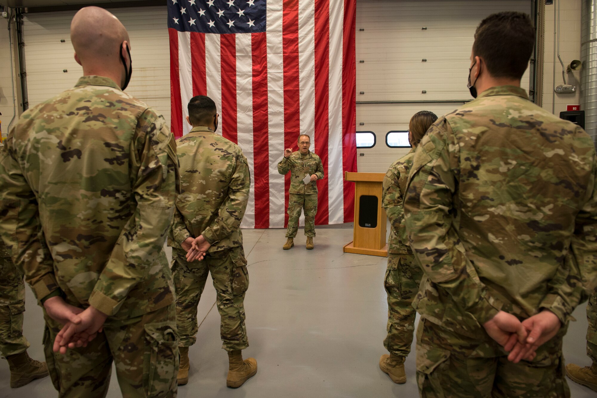 Members of the Connecticut Air National Guard, 103rd Air Control Squadron stand in formation during a briefing by Maj. Gen. Fran Evon, The Adjutant General of the Connecticut National Guard, April 15, 2021 in Orange, Connecticut. Members of 103rd ACS deployed to multiple locations in Southwest Asia and the United States in support of Operation Inherent Resolve and Mission Resolute Support. (U.S. Air National Guard photo by Master Sgt. Tamara R. Dabney)