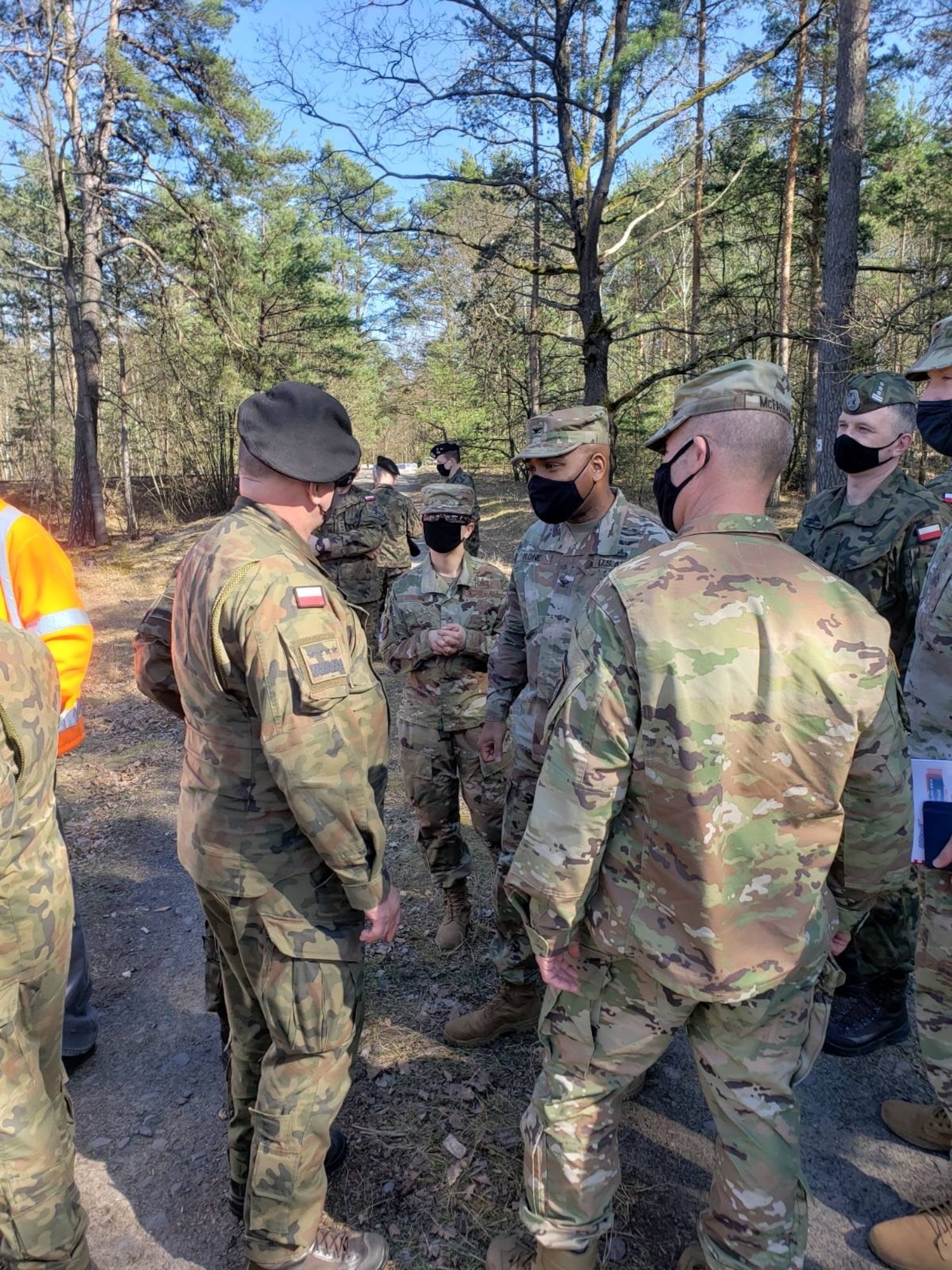 Tech Sgt. Roza Kowal (middle) provides language and culture support between U.S. Army and Polish forces during the 1/1 CD Brigade Combat Team deployment to Europe.