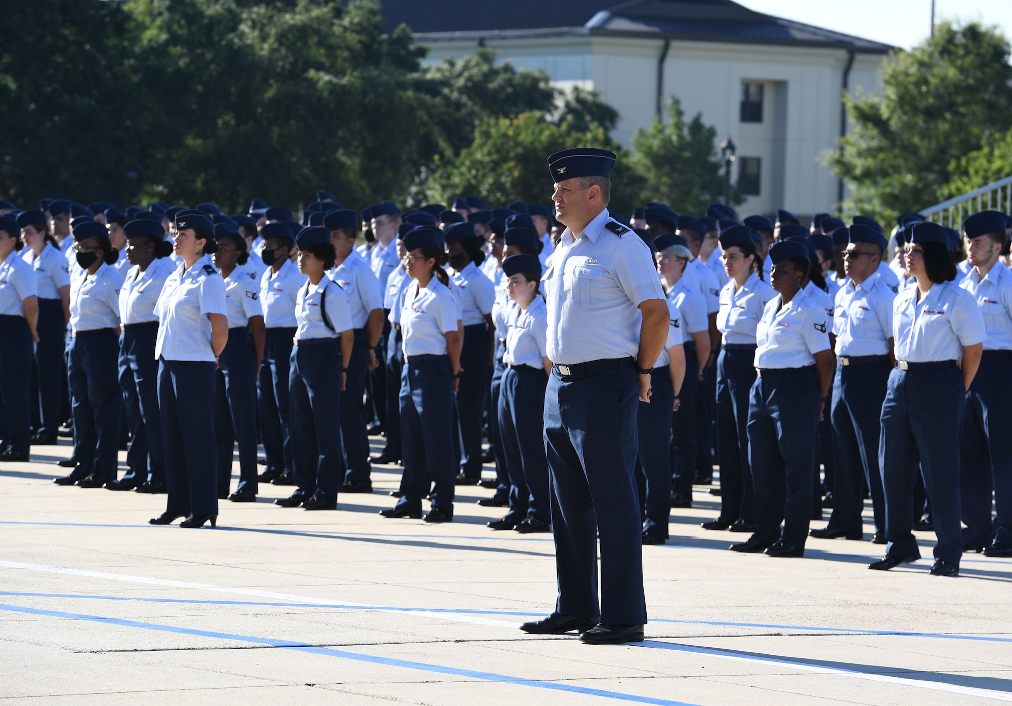 U.S. Air Force Col. James Kafer, 81st Training Wing vice commander, stands in formation with Airmen from the 81st Training Group during the 81st TRW change of command ceremony on the Levitow Training Support Facility drill pad at Keesler Air Force Base, Mississippi, June 17, 2021. The ceremony is a symbol of command being exchanged from one commander to the next by the handing-off of a ceremonial guidon. Col. Heather Blackwell relinquished command of the 81st TRW to Col. William Hunter. (U.S. Air Force photo by Kemberly Groue)