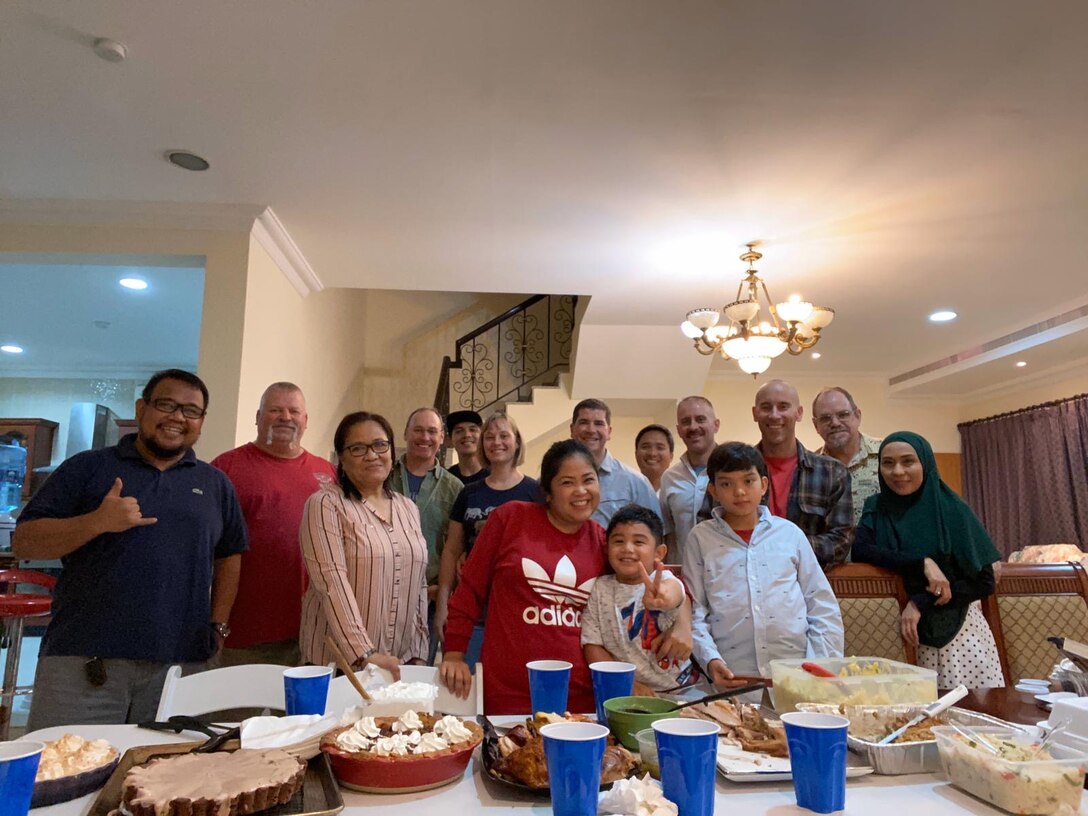 Major Grant Wanamaker and his wife Emma host members of the U.S. Army Corps of Engineers Transatlantic Middle East District's Bahrain Residence Office for a traditional Thanksgiving dinner in their home in Bahrain November 2019.