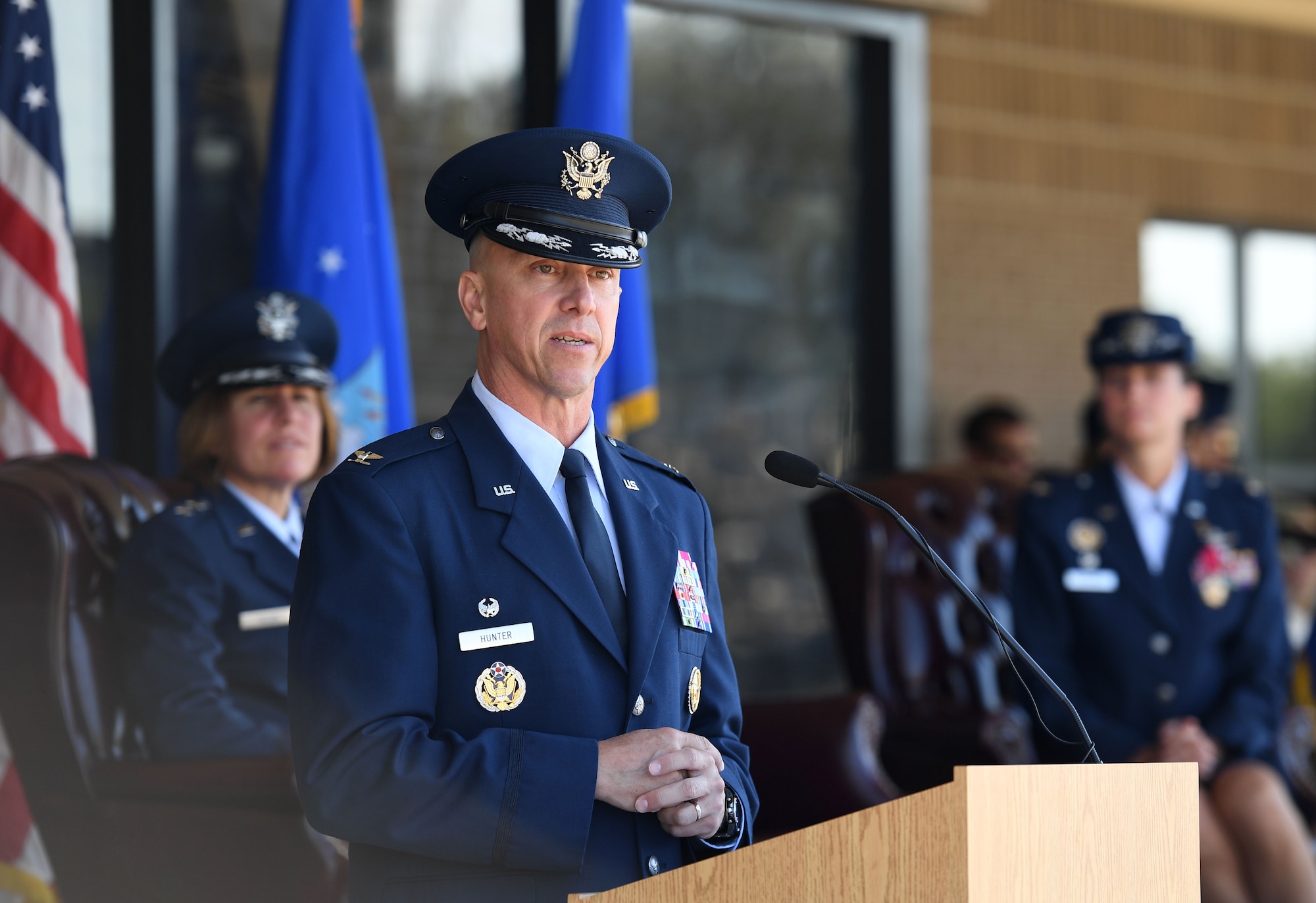 U.S. Air Force Col. William Hunter, 81st Training Wing commander, addresses his new command during a change of command ceremony on the Levitow Training Support Facility drill pad at Keesler Air Force Base, Mississippi, June 17, 2021. Hunter assumed command of the 81st TRW from Col. Heather Blackwell. (U.S. Air Force photo by Kemberly Groue)