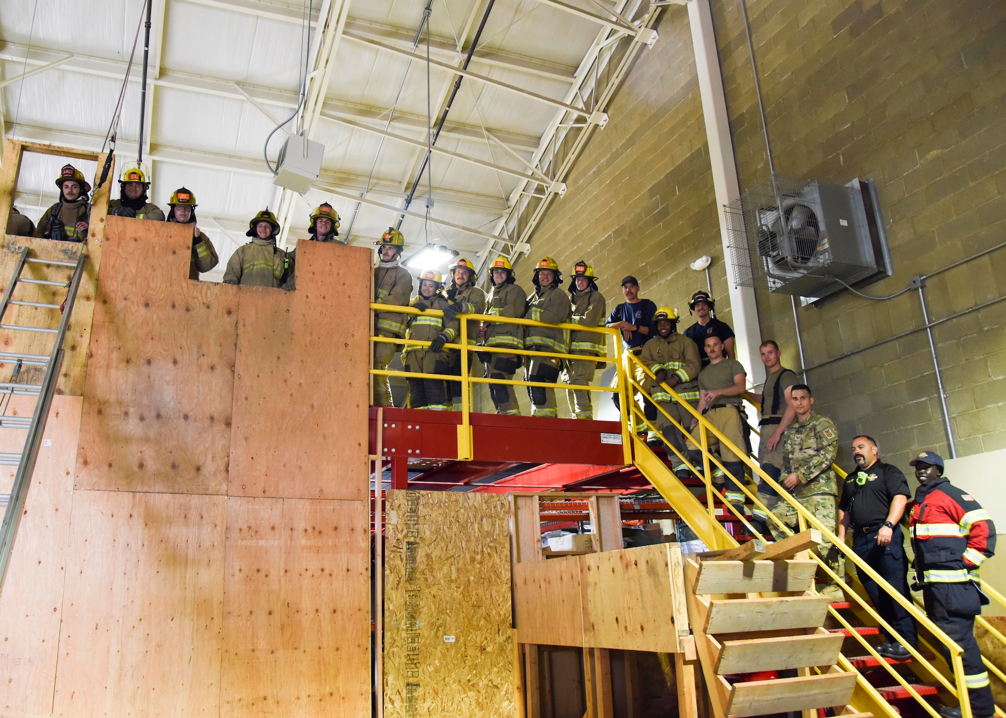 Firefighters pose for a group photo.