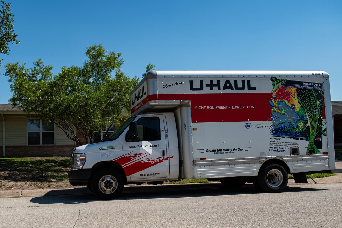 A moving truck sits at the ready to move a family from Laughlin Air Force Base, Texas, June, 16, 2021 to their new home and base. There has been a shortage and complications with organizing PCS moves due to the COVID-19 pandemic. (U.S. Air Force photo by Airman 1st Class David Phaff)