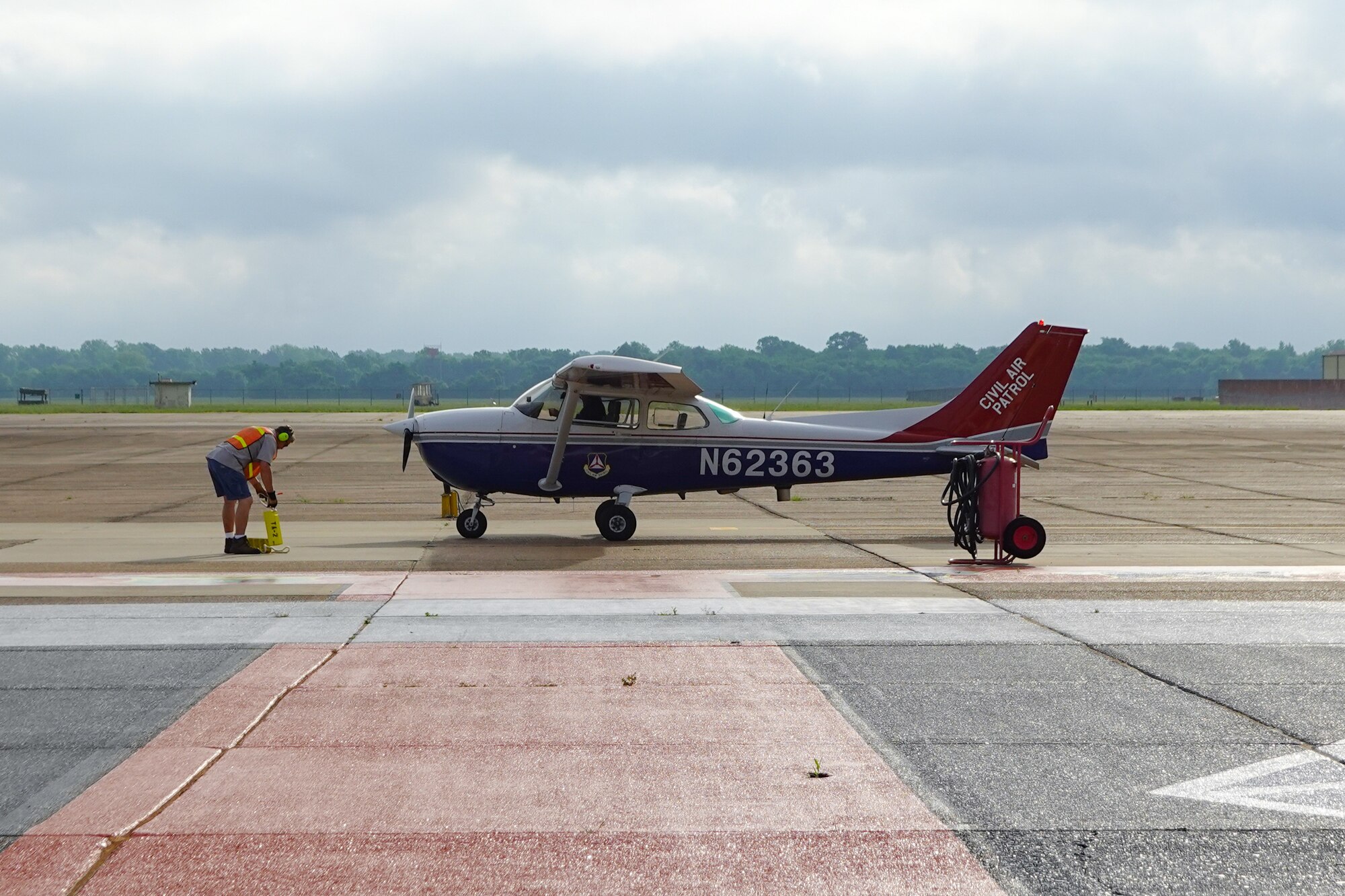 Shreveport Civil Air Patrol aircrew conducts maintenance on a Cessna 182 Skylane at Barksdale Air Force Base, Louisiana, May 28, 2021. The Air Force and CAP joined services as Total Force Integration partners in the first ever Mid-Air Collision Avoidance flight safety mission. (Courtesy photo by Master Sgt. Steven Vance Jr.)