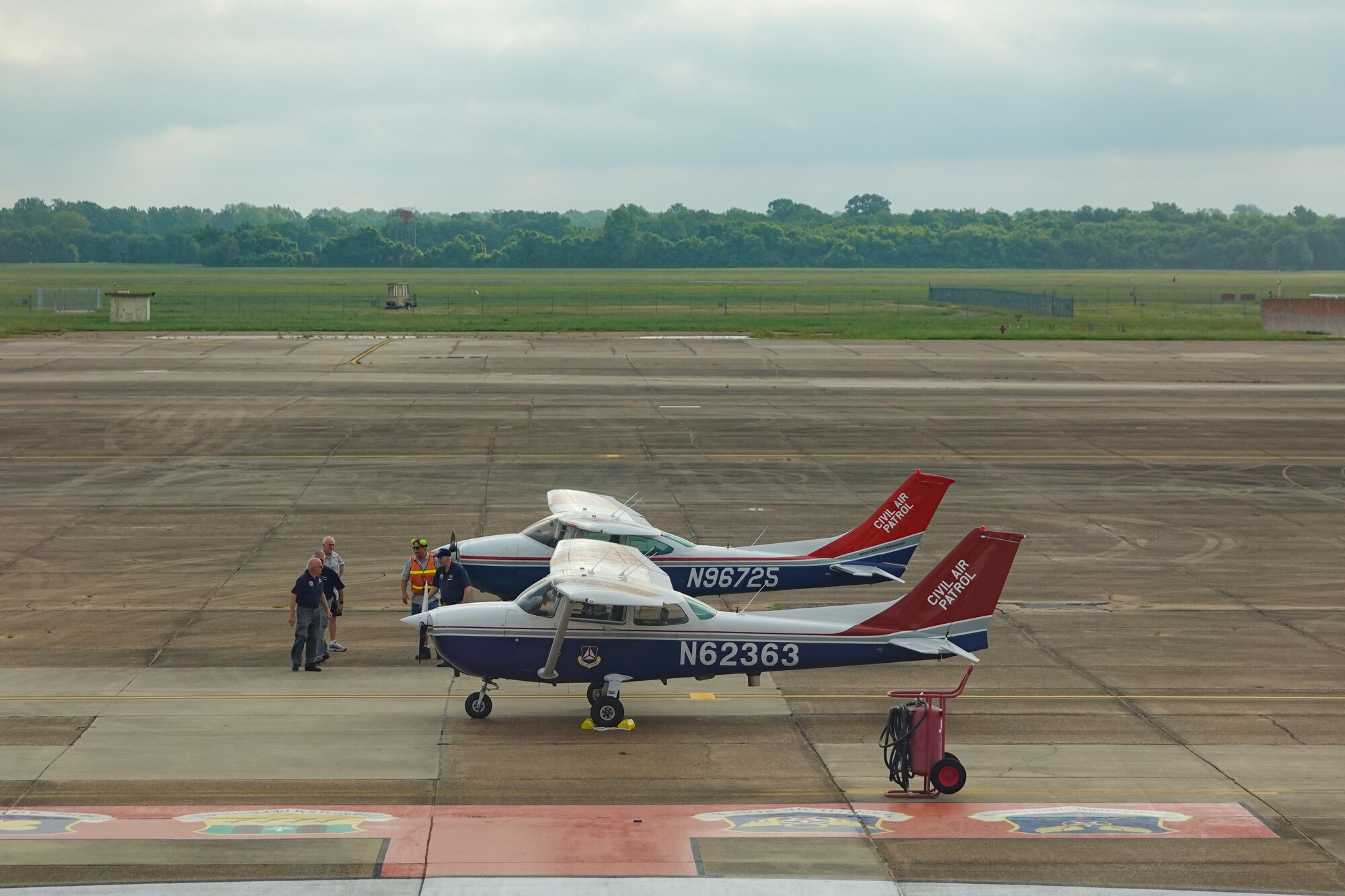 Shreveport Civil Air Patrol aircrew conducts maintenance on a Cessna 182 Skylane at Barksdale Air Force Base, Louisiana, May 28, 2021. The Air Force and CAP joined services as Total Force partners in the first ever Mid-air Collision Avoidance flight safety mission. (Courtesy photo by Master Sgt. Steven Vance Jr.)